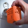 Adapter podróżny do ładowania Matador Global Travel Adapter Forget me not orange